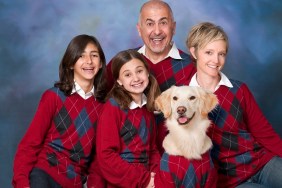 Humorous family portrait with golden retriever dog all in cardigans.