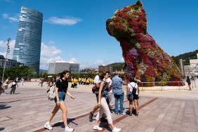 BILBAO, BASQUE COUNTRY, VIZCAYA, SPAIN - 2019/07/30: Jeff Koons Puppy dog sculpture in Guggenheim museum