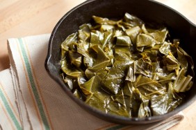 Overhead shot of collard greens in cast iron skillet