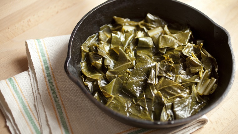 Overhead shot of collard greens in cast iron skillet