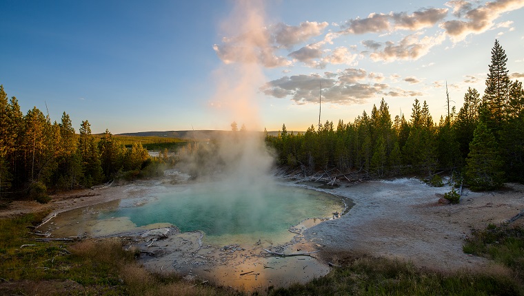 Sunset at a hotspring in Norris area, Yellowstone National Park, Wyoming.