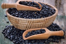 black bean in the spoon on table