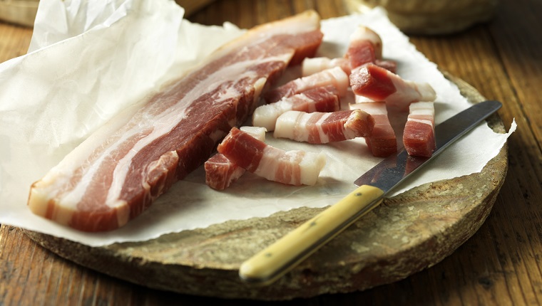 Pancetta on vintage chopping board