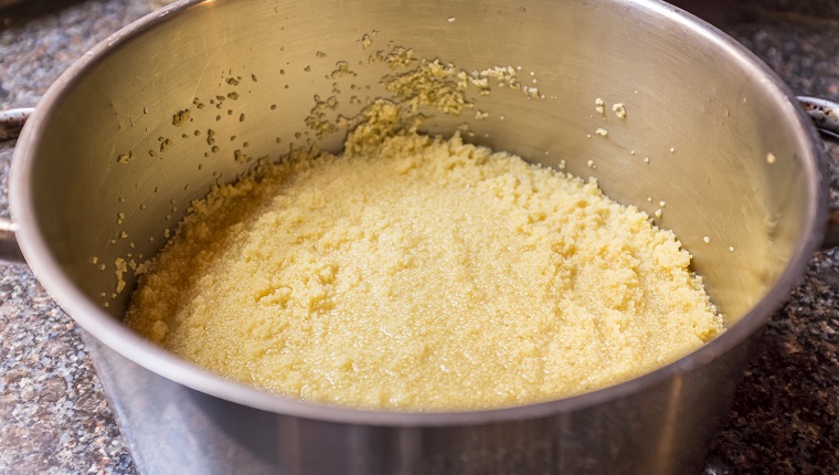 Cooking couscous in a pan in Morocco