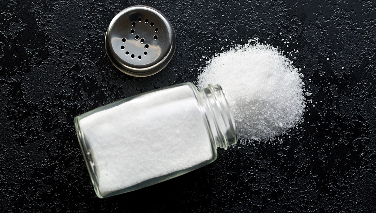 salt shaker on black kitchen table