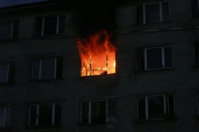 An apartment engulfed in flames like the one where a man stole his estranged's wife's dog.