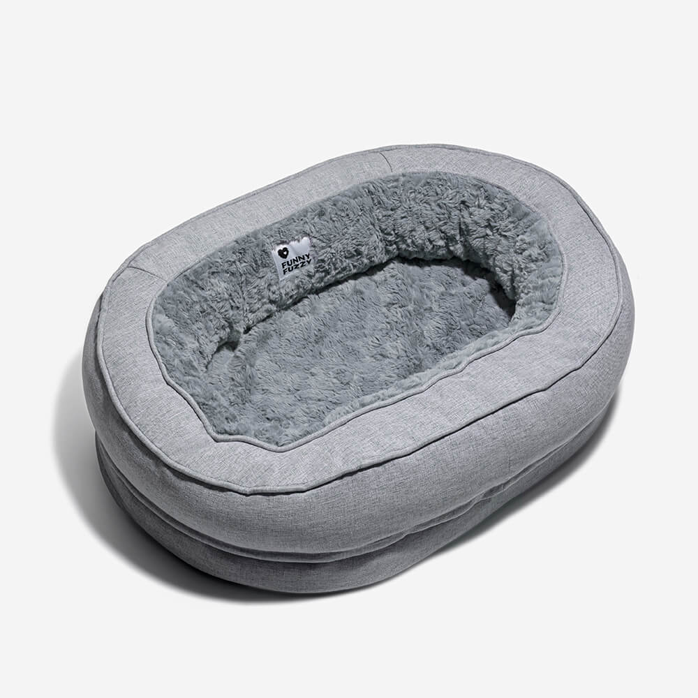 Grey FunnyFuzzy dog bed donut.