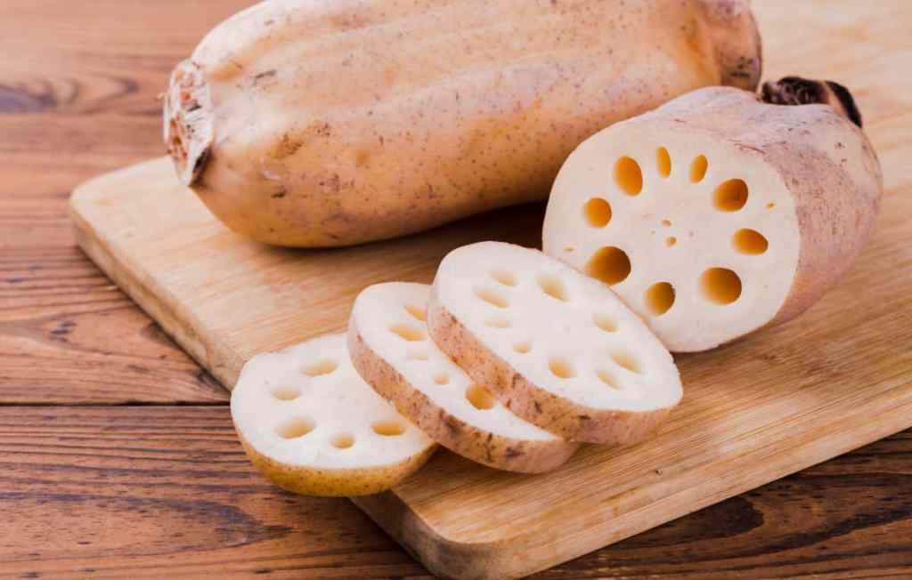 Lotus root chopped on a cutting board.