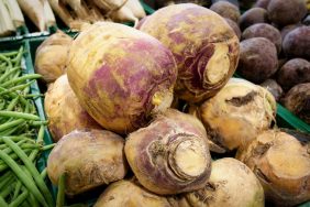 Stacked rutabaga roots at a regional farmers' market in Germany